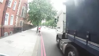 Cyclist Nearly Crushed By Truck While Crossing Busy Intersection
