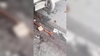 Man Splashed Under Truck