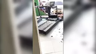 Man Crashes Car Into Glass Window
