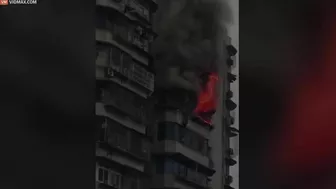 Heartbreaking Moment Man Clings To Burning Skyscraper