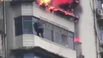 Heartbreaking Moment Man Clings To Burning Skyscraper