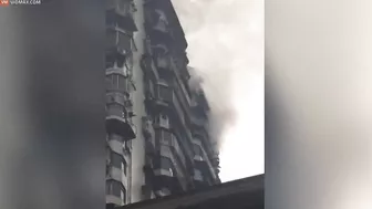 Heartbreaking Moment Man Clings To Burning Skyscraper