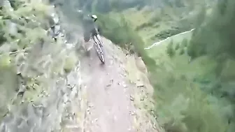 Horrifying Moment Cyclist Loses Balance And Falls Off Cliff