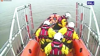 Lifeboat Crew Rescues Woman Who Can't Swim From Rooftop