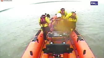 Lifeboat Crew Rescues Woman Who Can't Swim From Rooftop
