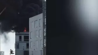 Man Escapes Burning Building By Grabbing Crane Hook