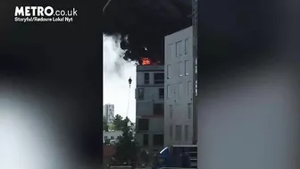 Man Escapes Burning Building By Grabbing Crane Hook