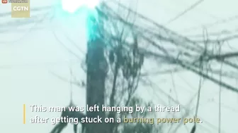 Man Trapped On Burning Power Pole