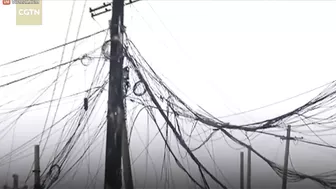 Man Trapped On Burning Power Pole