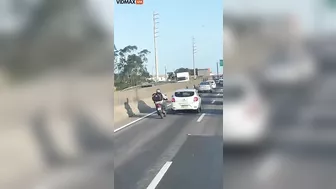 Man Hits Car On Motorcycle Road And Drives Unsteadily