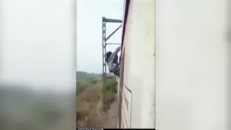 Man Performs Silly Stunt On Top Of Train And Gets Electrocuted