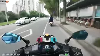 Motorcyclist Showing Middle Finger To Several People On Motorcycles