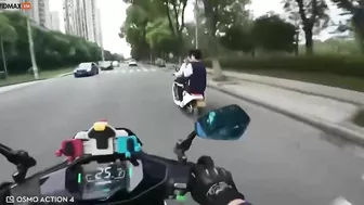 Motorcyclist Showing Middle Finger To Several People On Motorcycles