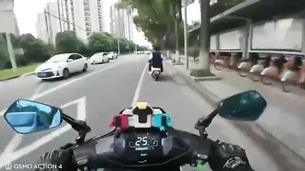 Motorcyclist Giving Middle Finger To Moped Driver