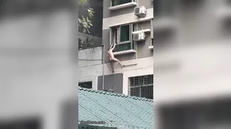 Spiderman Falls Naked From A Building