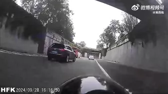 Beijing Photographer Pinned To Wall By SUV