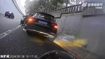 Beijing Photographer Pinned To Wall By SUV