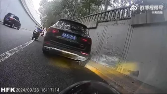 Beijing Photographer Pinned To Wall By SUV