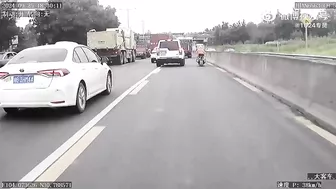 Truck Hits Motorcyclist's Head