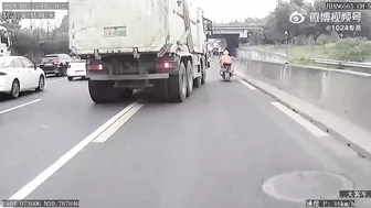 Truck Hits Motorcyclist's Head