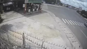 Motorcycle Speeding Into Gas Station