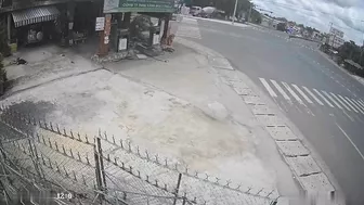 Motorcycle Speeding Into Gas Station