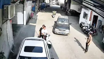 Stupid Chinese man crashed between truck and car