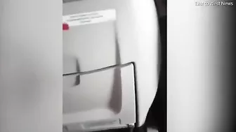 Terrifying moment passengers grip seats as plane forced to land 