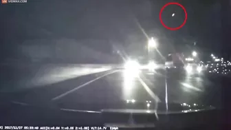 UFO spotted in the sky moments before truck dramatically topples