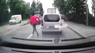 Useless Idiot Runs In Front Of Car Without Looking