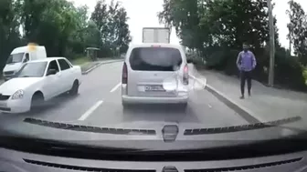 Useless Idiot Runs In Front Of Car Without Looking