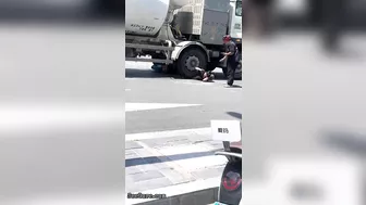 Woman Pinned Under A Cement Truck