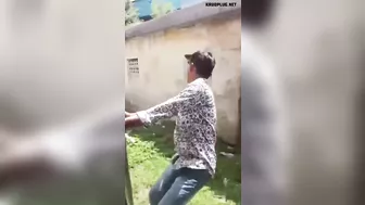 Young man hits a concrete post while hanging