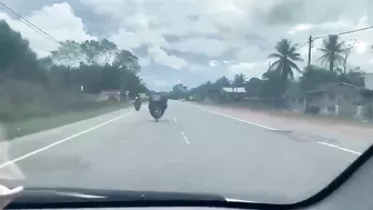 The Big Guy On The Motorcycle Is Not Having A Good Day