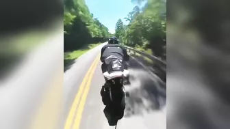 Cyclist Thrown Over Guardrail