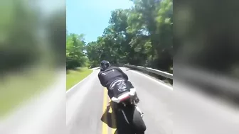 Cyclist Thrown Over Guardrail