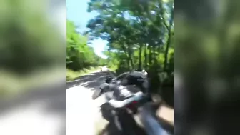 Cyclist Thrown Over Guardrail