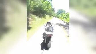 Cyclist Thrown Over Guardrail
