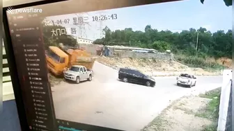 Chinese Pedestrian Nearly Buried By Truck