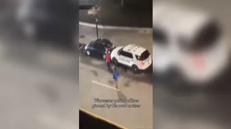 Police Officer Trapped In His Own Car