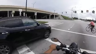Bicyclists Gain Karma Immediately After Running A Red Light
