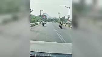Inattentive Cyclist Gets Caught In Oncoming Traffic