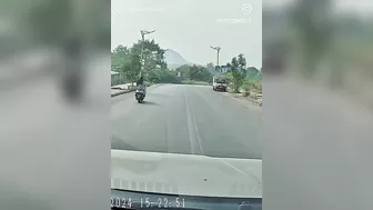Inattentive Cyclist Gets Caught In Oncoming Traffic