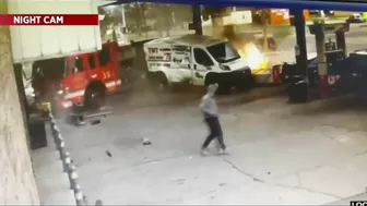 Fire Truck Rushes Into Gas Station