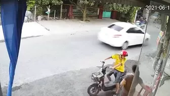Motorcyclist Was So Busy Looking At Woman That He Ended Up Hitting His Face Into A Wall