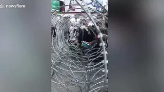 Motorcyclist Crashes Into Police Wire Fence