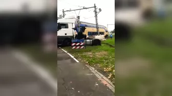 Passenger Train Hits Trapped Truck At Railway Crossing