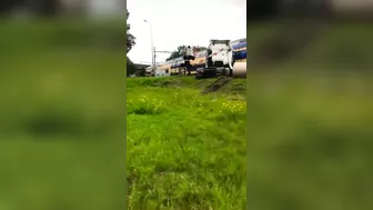 Passenger Train Hits Trapped Truck At Railway Crossing