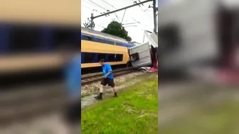 Passenger Train Hits Trapped Truck At Railway Crossing
