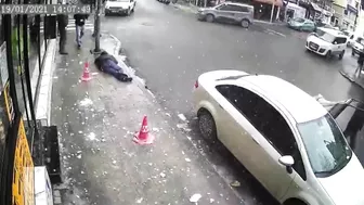 Pedestrian Hit Directly By Falling Ice